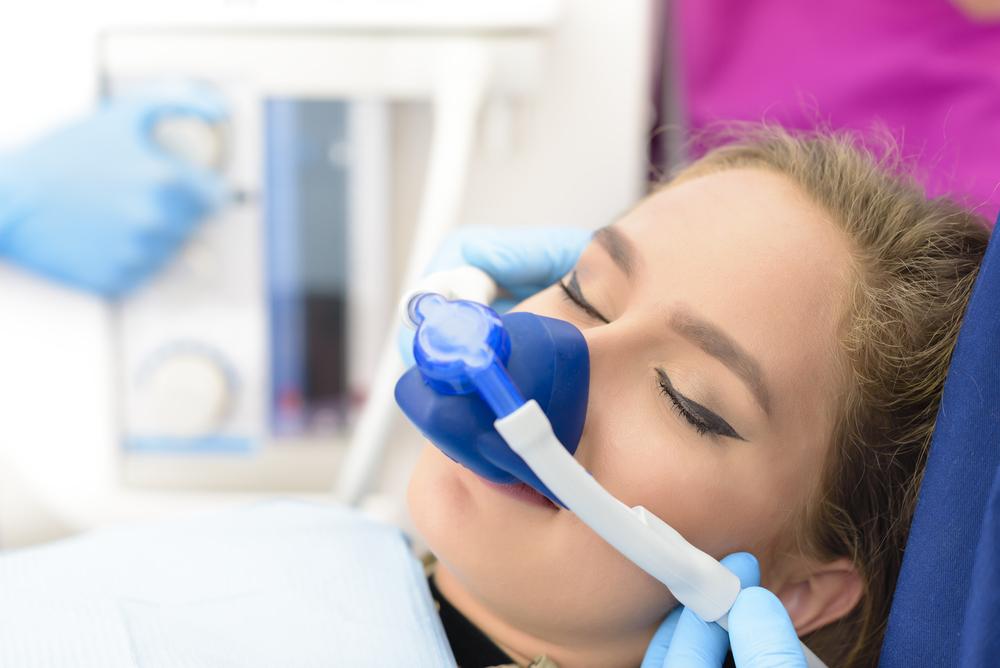 woman undergoing nitrous oxide dental sedation
