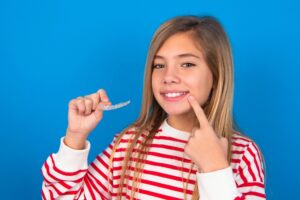 teen with invisalign