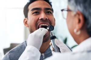 oral cancer screening performed by doctor or dentist
